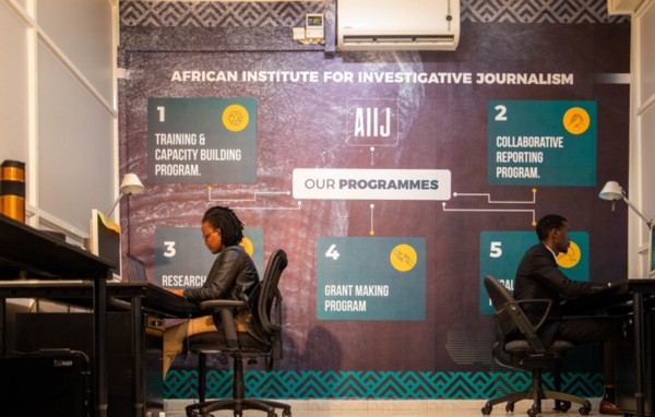 AIIJ’s head of training and capacity building Eve Masawi and fellow Hakim Wampamba at work. Image: Supplied