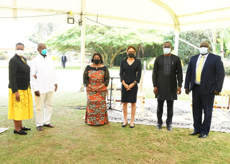 Eng. Joel Aita at State House, Entebbe with President Yoweri Museveni, First Lady Janet Museveni, the then Vice President of Liberia, Jewel Cianeh Taylor, and other officials.
